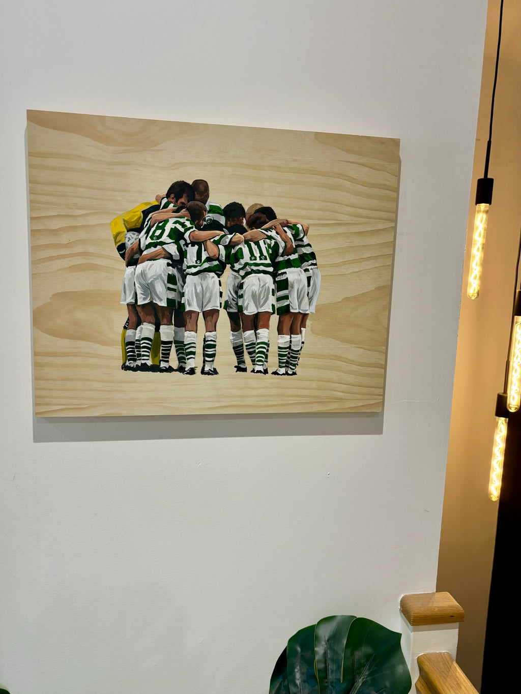 The First Huddle wooden panel