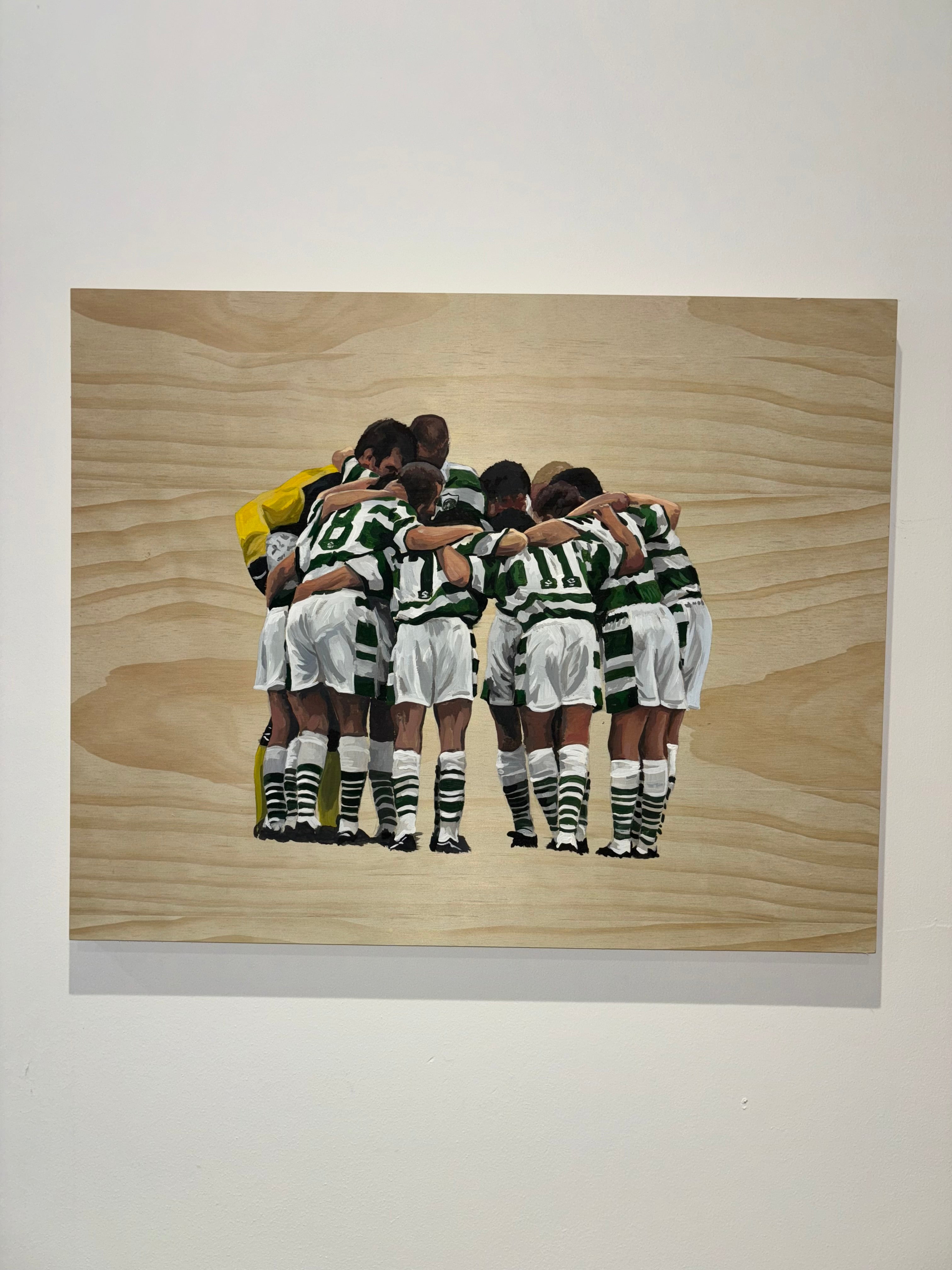 The First Huddle wooden panel